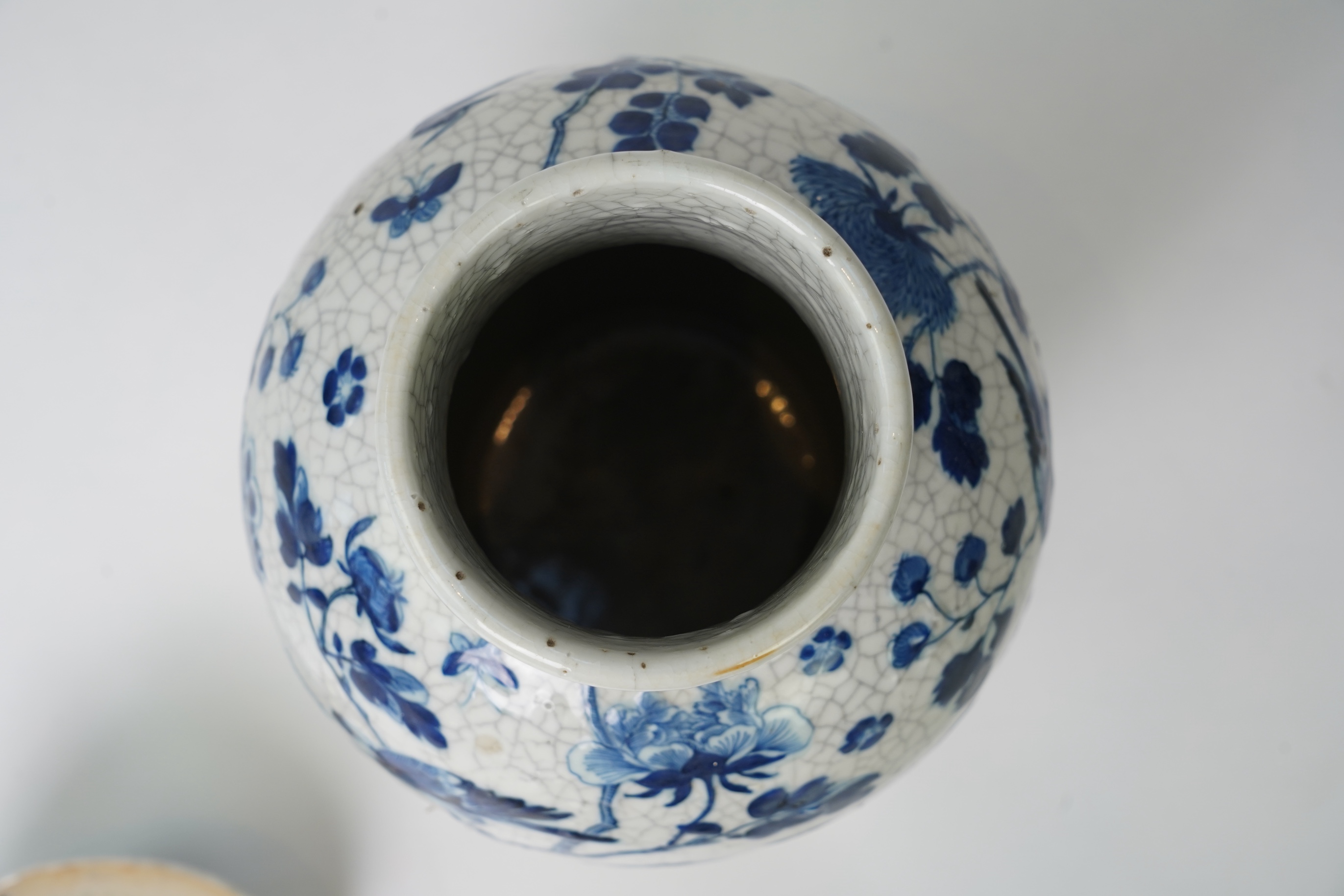 A Chinese blue and white crackle glaze baluster vase and cover, early 20th century
